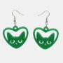 Plexiglas oorbellen met poezenhoofd in hartvorm Oorbellen gelaserd uit plexiglas met een poezenhoofd in een hartje.